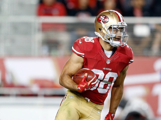Jarryd Hayne #38 of the San Francisco 49ers returns a punt against the San Diego Chargers during their NFL preseason game at Levi's Stadium on September 3, 2015