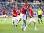 Norway's Jo Inge Berget (R) celebrates scoring 1 - 0 with his teammates Markus Henriksen (L) and Even Hovland during the Euro 2016 Group H qualifying football match between Norway and Croatia at in Oslo, on September 6, 2015.