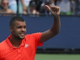 Jo-Wilfried Tsonga of France celebrates after defeating Jarkko Nieminen of Finland during their 2015 US Open Men's Singles round 1 match at the USTA Billie Jean King National Tennis Center August 31, 2015