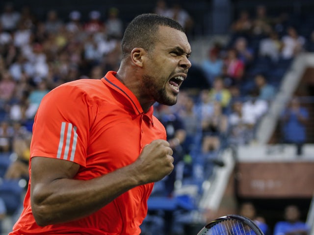 Jo-Wilfried Tsonga of France reacts as he plays against to Marcel Granollers of Spain during their 2015 US Open Men's Singles round 2 match at the USTA Billie Jean King National Tennis Center September 2, 2015