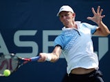 Kevin Anderson of South Africa returns a shot to Andrey Rublev of Russia during their Men's Singles First Round match on Day Two of the 2015 US Open at the USTA Billie Jean King National Tennis Center on September 1, 2015 in the Flushing neighborhood of t