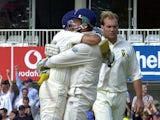 Marcus Trescothick (C), Man of Match for 5th Test, lifts fellow batsman Mark Butcher (L) as England celebrates beating South Africa, 08 September 2003