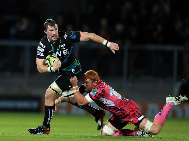 Morgan Allen of Ospreys is tackled by Joel Conlon of Exeter Chiefs during the LV= Cup match between Exeter Chiefs and Ospreys at Sandy Park on November 17, 2012 in Exeter, England.
