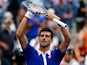 Novak Djokovic of Serbia celebrates after defeating Joao Souza of Brazil in their Men's Singles First Round match on Day One of the 2015 US Open at the USTA Billie Jean King National Tennis Center on August 31, 2015
