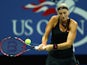 Petra Kvitova of the Czech Republic plays a backhand during her first round match against Laura Siegemund of Germany on Day Two of the 2015 US Open at the USTA Billie Jean King National Tennis Center on September 1, 2015 in the Flushing neighborhood of th