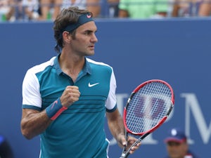 Federer labours past Kohlschreiber