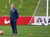 Roy Hodgson surveys the land during an England training session on September 2, 2015