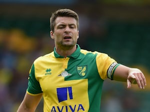 Russell Martin of Norwich City in action during the pre season friendly  match between Norwich City and Brentford at Carrow Road on August 1, 2015  in Norwich, England. - Sports Mole
