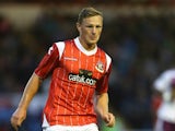 Sam Mantom of Walsall runs with the ball during the pre season friendly match between Walsall and Aston Villa at the Banks' Stadium on July 31, 2013 in Walsall, England.