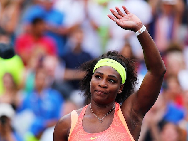 Serena Williams of the United States celebrates after defeating Madison Keys of the United States during their Women's Singles Fourth Round match on Day Seven of the 2015 US Open