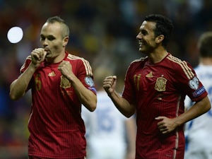 Spain take top spot after Slovakia win
