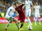 David Silva of Spain duels for the ball with Tomas Hubocan of Slovakia during the Spain v Slovakia EURO 2016 Qualifier at Carlos Tartiere on September 5, 2015 in Oviedo, Spain.