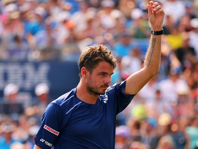 Stanislas Wawrinka of Switzerland reacts during his Men's Singles Second Round match against Hyeon Chung of Korea on Day Four of the 2015 US Open at the USTA Billie Jean King National Tennis Center on September 3, 2015