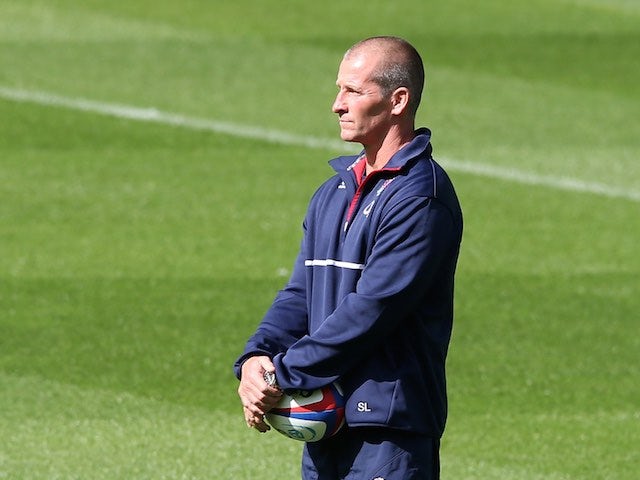 England head coach Stuart Lancaster watches on during a training session on September 4, 2015