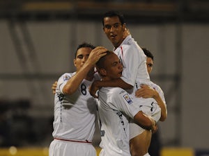 Theo Walcott of England celebrates scoring his team's second goal with his team mates during the FIFA 2010 World Cup Qualifying Group Six match between Croatia and England at the Maksimir Stadium on September 10, 2008