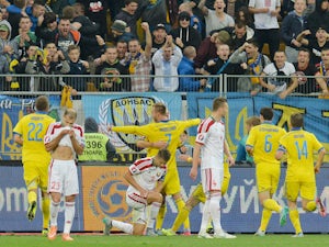 Ukrainian Andriy Yarmolenko (C) celebrates after scoring during the Euro 2016 qualifyinvg round - Group C football match between Ukraine and Belarus at Arena Lviv stadium in Lviv on September 5, 2015