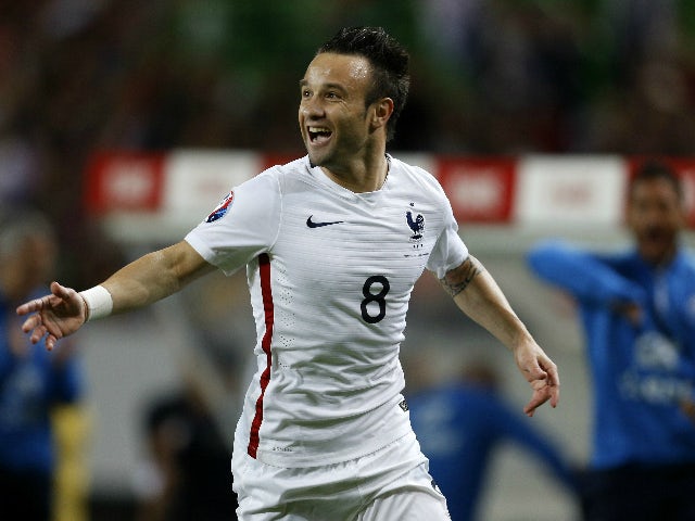 France's forward Mathieu Valbuena celebrates his goal during the Euro 2016 friendly football match Portugal vs France at the Jose Alvalade stadium in Lisbon on September 4, 2015. 