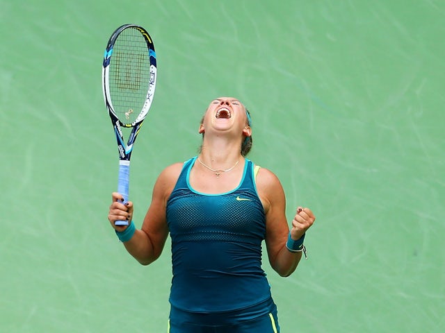Victoria Azarenka of Belarus celebrates match point against Yanina Wickmayer of Belgium during their Women's Singles Second Round match on Day Four of the 2015 U.S. Open at the USTA Billie Jean King National Tennis Center on September 3, 2015