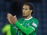 Virgl Van Dijk of Celtic applauds the fans after the game at the Scottish premiership match between Kilmarnock and Celtic at Rugby Park on August 12, 2015