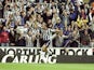 Newcastle fans celebrate as Alan Shearer scores against Sheffield Wednesday on September 19, 1999