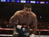 Anthony Joshua takes a bow after sparking out Gary Cornish on September 12, 2015