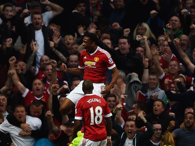 Anthony Martial celebrates scoring on his Man Utd debut against Liverpool on September 12, 2015