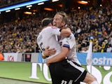 Forward Marc Janko (R) of Austria celebrates with his teammate Defender Christian Fuchs after scoring a goal during the Euro 2016 qualifying group G football match between Sweden and Austria at the Friends Arena in Solna, near Stockholm on September 8, 20
