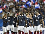 France's midfielder Blaise Matuidi (2nd L) celerates with his teammates after scoring his second goal during the Euro 2016 friendly football match France vs Serbia at the stadium in Bordeaux on September 7, 2015. 