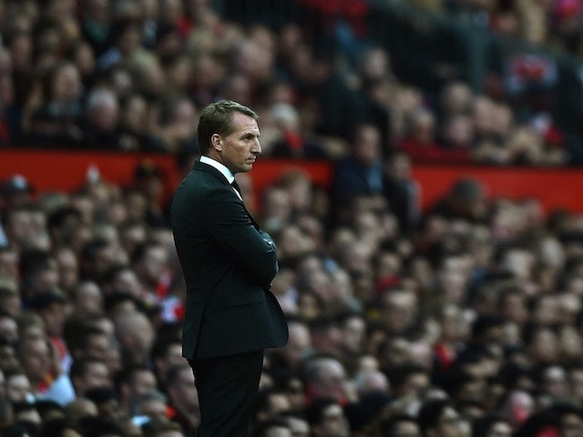Liverpool boss Brendan Rodgers watches on at Old Trafford on September 12, 2015