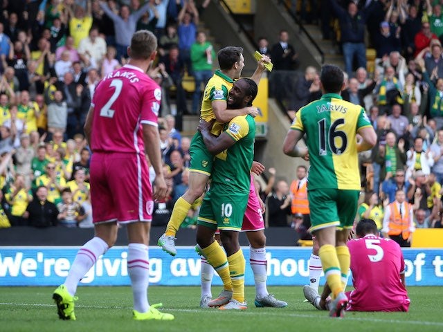 Cameron Jerome celebrates scoring the opener for Norwich against Bournemouth on September 12, 2015