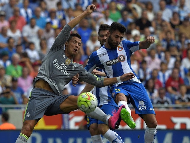Cristiano Ronaldo knocks one past Espanyol's Ruben Duarte on September 12, 2015