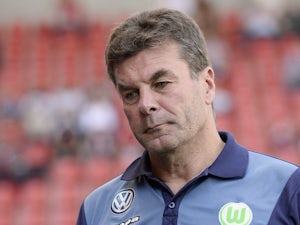 Wolfsburg coach Dieter Hecking arrives for his team's game with Ingolstadt on September 12, 2015