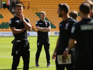 Eddie Howe looks on ahead of Bournemouth's match with Norwich on September 12, 2015