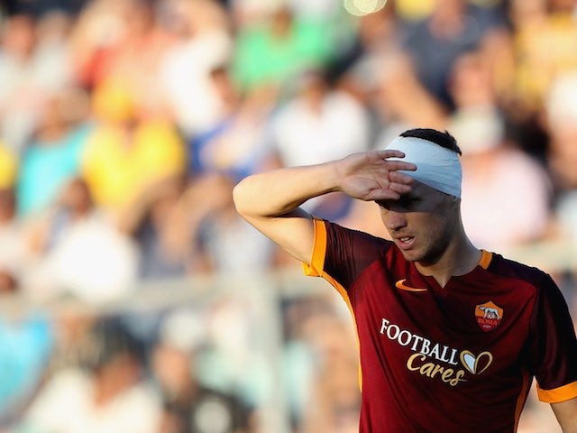 A bandaged Edin Dzeko in action for Roma against Frosinone on September 12, 2015