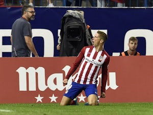 Fernando Torres drops to his knees after scoring for Atletico Madrid against Barcelona on September 12, 2015
