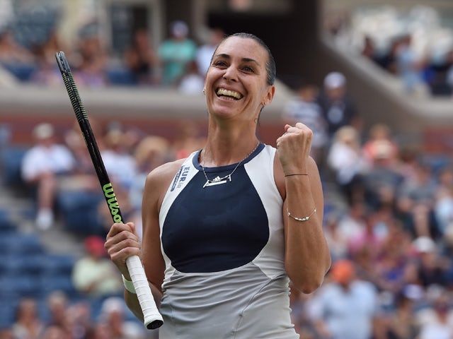 Flavia Pennetta of Italy celebrates match point against Petra Kvitova of the Czech Republic during their 2015 US Open Women's Singles - Quarterfinals at the USTA Billie Jean King National Tennis Center September 9, 2015