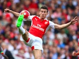 An acrobatic Laurent Koscielny in action for Arsenal against Stoke on September 12, 2015
