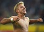 Hamburg's Lewis Holtby celebrates after his side defeat Borussia Monchengladbach 3-0 on September 11, 2015