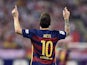 Lionel Messi celebrates scoring the winner for Barcelona against Atletico Madrid on September 12, 2015