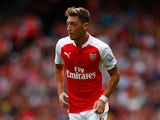 Mesut Ozil of Arsenal in action during the Barclays Premier League match between Arsenal and West Ham United at the Emirates Stadium on August 9, 2015