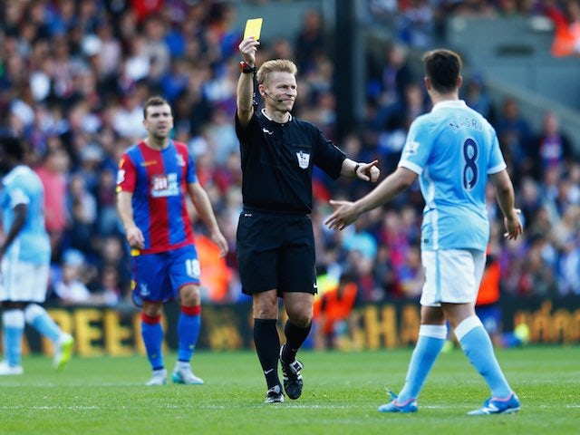 Mike Jones serves up some yellow card realness to Man City's Samir Nasri at Selhurst Park on September 12, 2015