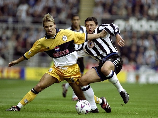 Niclas Alexandersson and Gary Speed battle for the ball during the match between Newcastle and Sheffield Wednesday on September 19, 1999