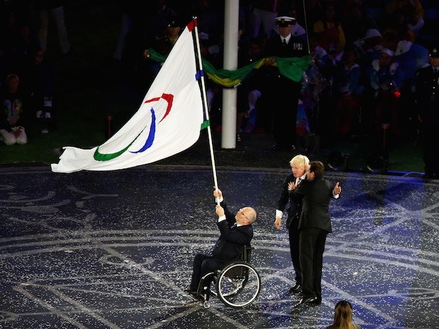 Mayor of London Boris Johnson, President of the IPC Sir Philip Craven MBE and Mayor of Rio de Janeiro Eduardo Paes perform the Paralympic flag handover ceremony during the closing ceremony on day 11 of the London 2012 Paralympic Games