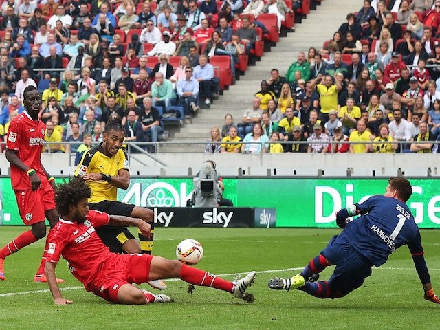 Pierre-Emerick Aubameyang scores Dortmund's third against Hannover on September 12, 2015