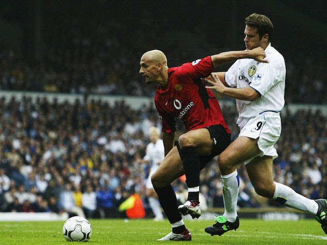 Rio Ferdinand of Manchester United battles for the ball with Mark Viduka of Leeds during the FA Barclaycard Premiership game between Leeds United and Manchester United at Elland Road in Leeds, England on September14 , 2002. 