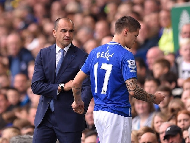 Everton boss Roberto Martinez acknowledges the injured Muhamed Besic on September 12, 2015