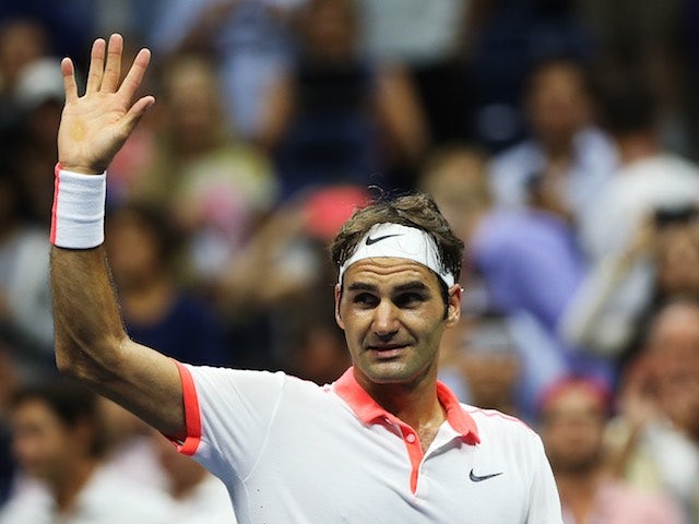 Roger Federer celebrates defeating Stan Wawrinka in the US Open semi-final on September 11, 2015