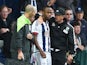 Tony Pulis speaks to Saido Berahino as he prepares to come on during West Brom's game with Southampton on September 12, 2015