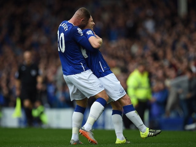 Steven Naismith is congratulated by teammate Ross Barkley after scoring Everton's second against Chelsea on September 12, 2015
