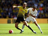 Watford's Valon Behrami is challenged by Jack Cork of Swansea on September 12, 2015
